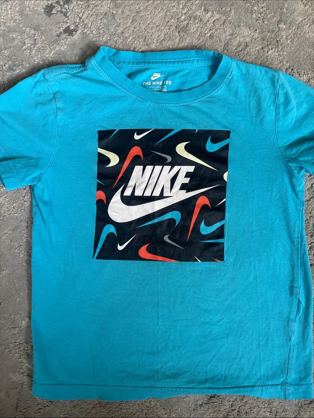 Nike Turquoise Short-Sleeve Tee with Multicolor Swoosh Graphic